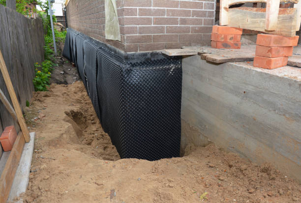 SJ Waterproofing Pros technician performing targeted Waterproofing assessment in Zanesville, IN